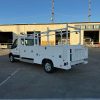 Ford E-Transit Custom Service Body with compartments, shelving, and 1300 lb lift gate