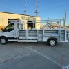 Ford E-Transit Custom Service Body with compartments, shelving, and 1300 lb lift gate