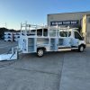 Ford E-Transit Custom Service Body with compartments, shelving, and 1300 lb lift gate