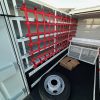 Ford F-550 service body superstructure shelves with custom cargo netting and spray-can baskets