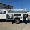 9-foot Diamond service body mounted on a 2026 Ford F-450 60-inch CA chassis, painted white with open-top compartments and aluminum diamond overlay lids.”