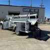 9-foot Diamond service body mounted on a 2026 Ford F-450 60-inch CA chassis, painted white with open-top compartments and aluminum diamond overlay lids.”