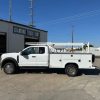 9-foot Diamond service body mounted on a 2026 Ford F-450 60-inch CA chassis, painted white with open-top compartments and aluminum diamond overlay lids.”