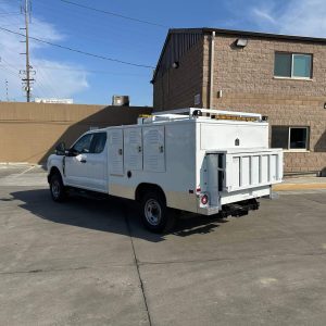 Ford F-250 animal control truck with 1300 lb Tommy liftgate and rear dead animal compartment access