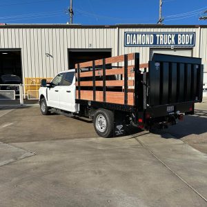 Flatbed truck body with 5 3/4 inch side rails and integrated rub guards for fleet use