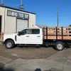 Flatbed truck body with 5 3/4 inch side rails and integrated rub guards for fleet use