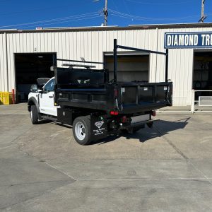 Rugby dump body with rigid steel sides and powder coated black finish
