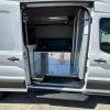 Prisoner transport van insert with 8 passenger cage system installed in Ford Transit