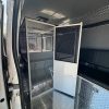 Prisoner transport van insert with 8 passenger cage system installed in Ford Transit