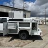 Utility truck body with air compressor and welding equipment