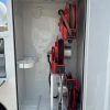 Mechanics truck with hose reels and welding cable storage