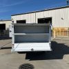 Animal transport compartments with ventilation and safety cage doors