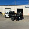 Steel flatbed truck body with hardwood deck on Ram 2500 work truck