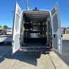 Sprinter van fold away shelving system installed in 170 extended high roof van