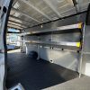 Sprinter van fold away shelving system installed in 170 extended high roof van