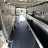 Sprinter van fold away shelving system installed in 170 extended high roof van