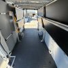 Sprinter van fold away shelving system installed in 170 extended high roof van