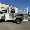 Diamond truck body with roll top cover