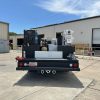 Crane service truck body on Ford F-450 with reinforced crane compartment and work platform
