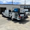 Crane service truck body on Ford F-450 with reinforced crane compartment and work platform