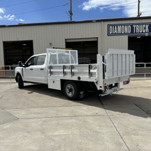 Ford F-350 flatbed with 1,600 lb Tommy Gate liftgate