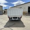 Ford F-350 flatbed with 1,600 lb Tommy Gate liftgate