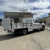 Ford F-350 flatbed with 1,600 lb Tommy Gate liftgate