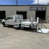 Ford F-350 flatbed with 1,600 lb Tommy Gate liftgate